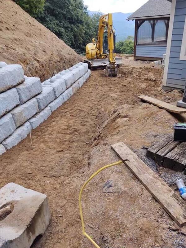 Retaining wall and site excavation with equipment