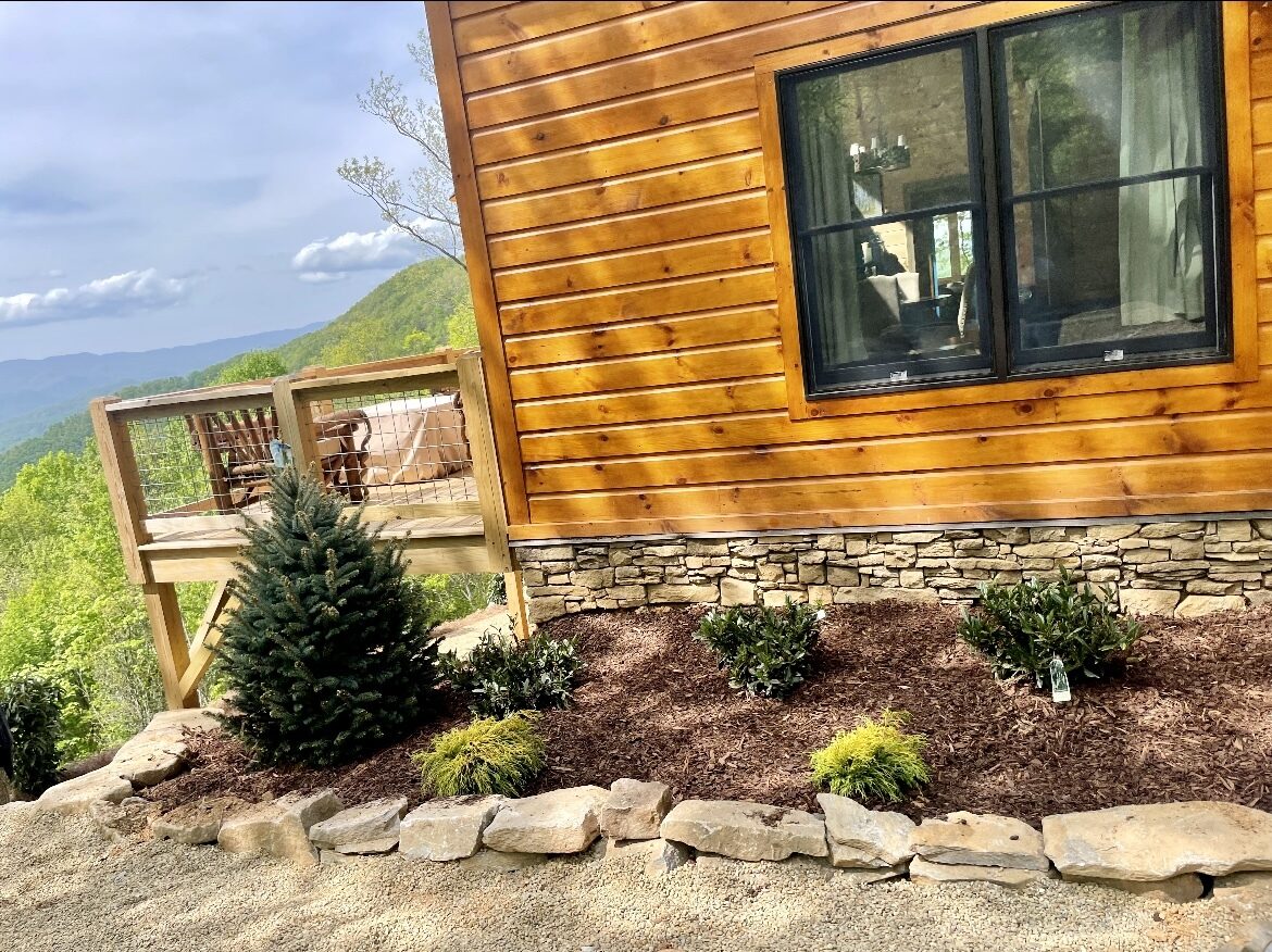 Retaining wall construction with excavator