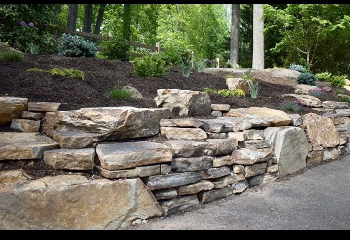 Mountain cabin deck with stone step approach